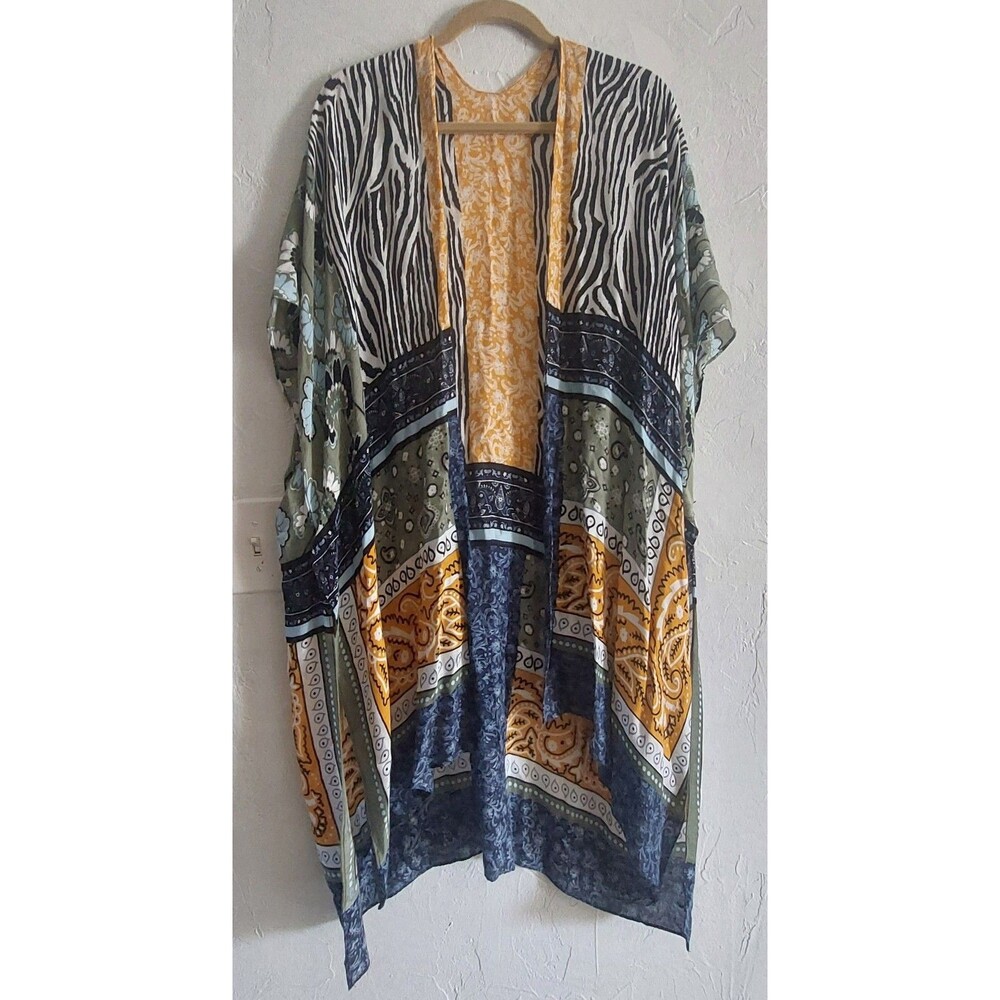 elegant and lightweight boho-style kimono cardigan featuring a vibrant,...